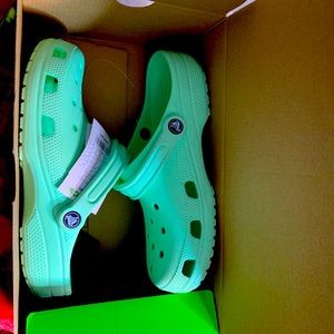 Mint green crocs